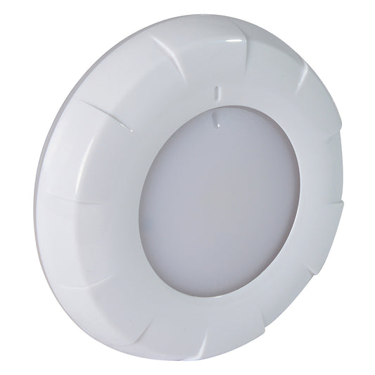 White circular LED puck light with textured bezel for auto or home installation