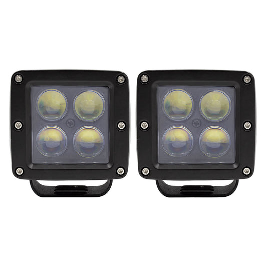 Pair of black square LED work lights with four circular lenses, ideal for off-road or auto lighting upgrades.