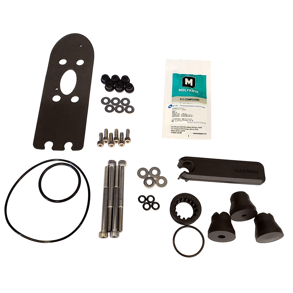Garmin mounting kit with hardware, Molykote compound, and installation tools for auto electronics