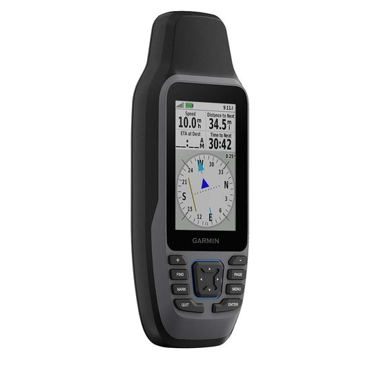 Garmin handheld GPS device displaying speed, distance, and compass for outdoor navigation
