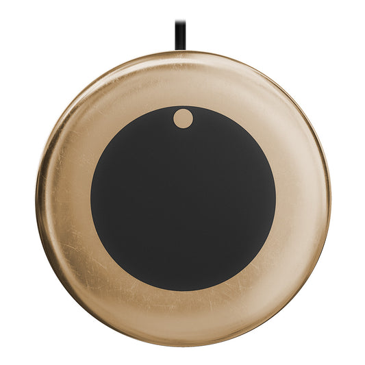 Gold wireless charging pad with black center and power cable