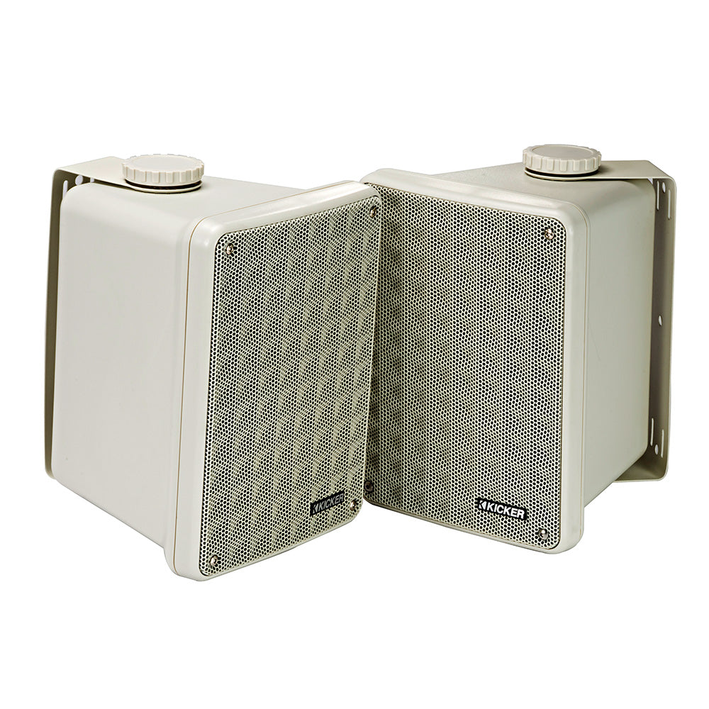 White Kicker outdoor speakers with mesh grilles and mounting brackets for patio or garage audio