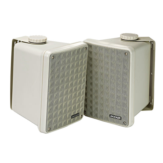 White Kicker outdoor speakers with mesh grilles and mounting brackets for patio or garage audio