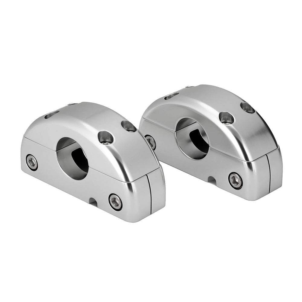 Shiny chrome motorcycle handlebar risers with bolt mounts for custom bike styling