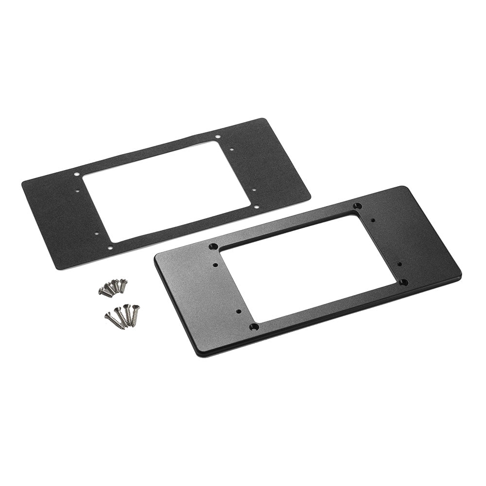 Black double DIN dash kit panels with mounting screws for car stereo installation