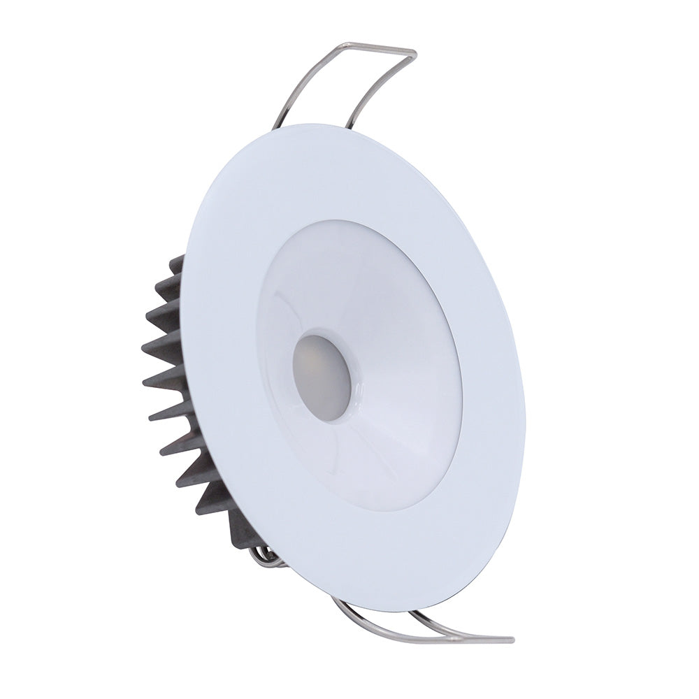 White LED recessed downlight with heat sink and mounting clips for residential or commercial installation