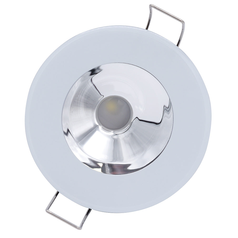 Round LED recessed ceiling light with chrome reflector and white trim for residential or commercial use