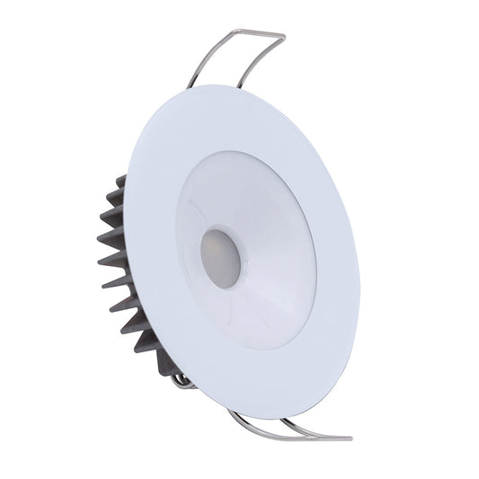 White LED recessed ceiling light with heat sink and mounting clips for residential or commercial use