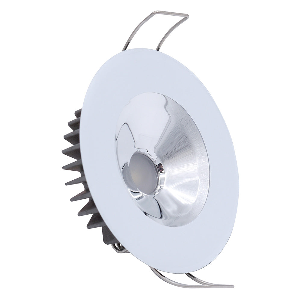 White LED recessed light with chrome reflector and heat sink fins for residential or commercial use