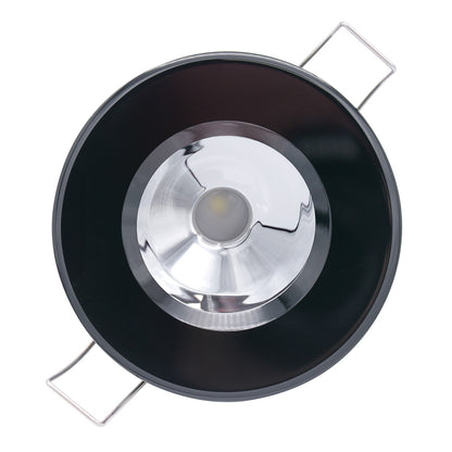 Black LED recessed light with chrome reflector and mounting clips for residential or commercial use