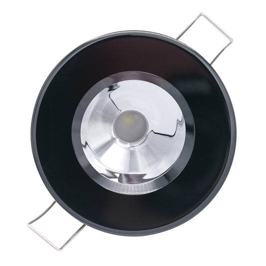 Black LED recessed light with chrome reflector and mounting clips for residential or commercial use