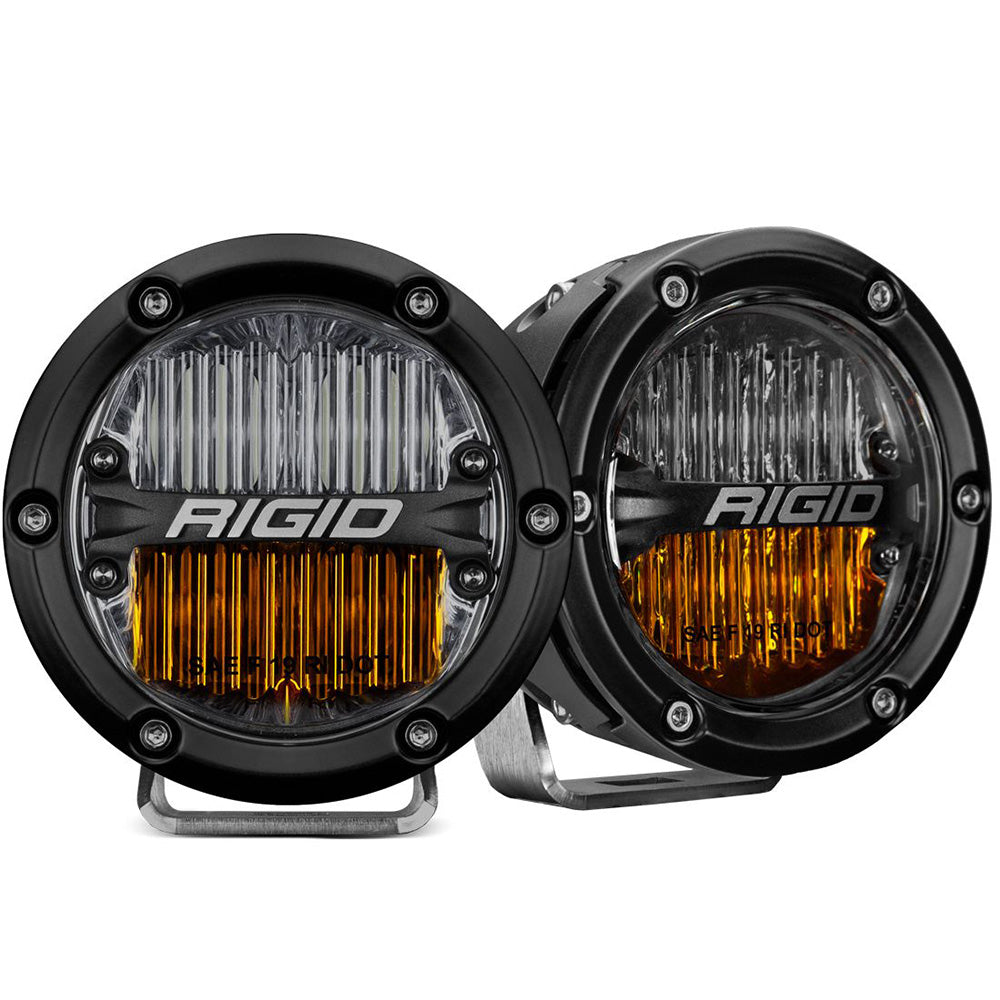 Rigid Industries SAE F19 LED driving lights with amber lenses and black bezels for off-road vehicles