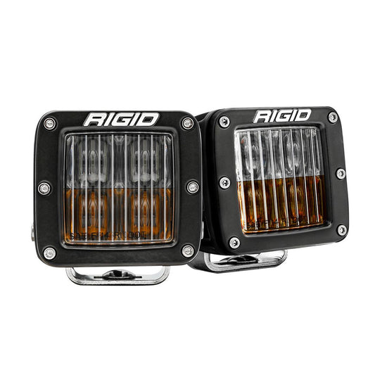 Rigid Industries Dually LED lights with amber lenses, rugged black housing, and SAE/DOT certified for off-road use.