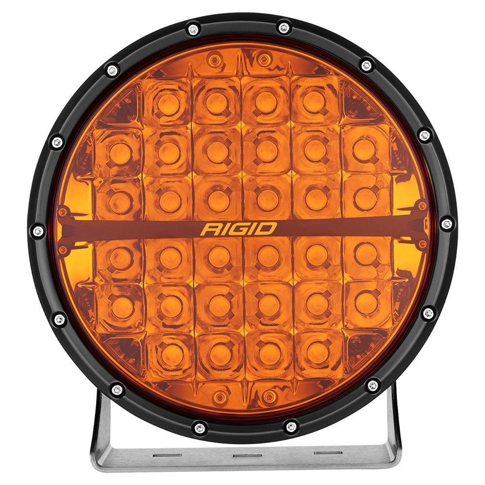 Rigid amber LED work light with black bezel, ideal for off-road and truck lighting installations