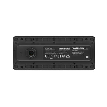 Garmin APX10 marine autopilot control unit with connector port and regulatory labels
