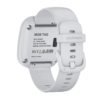 Garmin MOB Tag safety device with white strap, quick release buckle, and regulatory labels on back