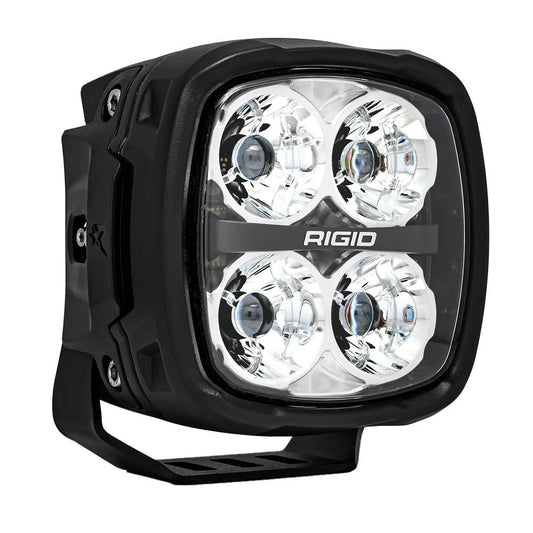 Rigid Industries LED off-road light with four bulbs, black housing, and clear lens for vehicle illumination
