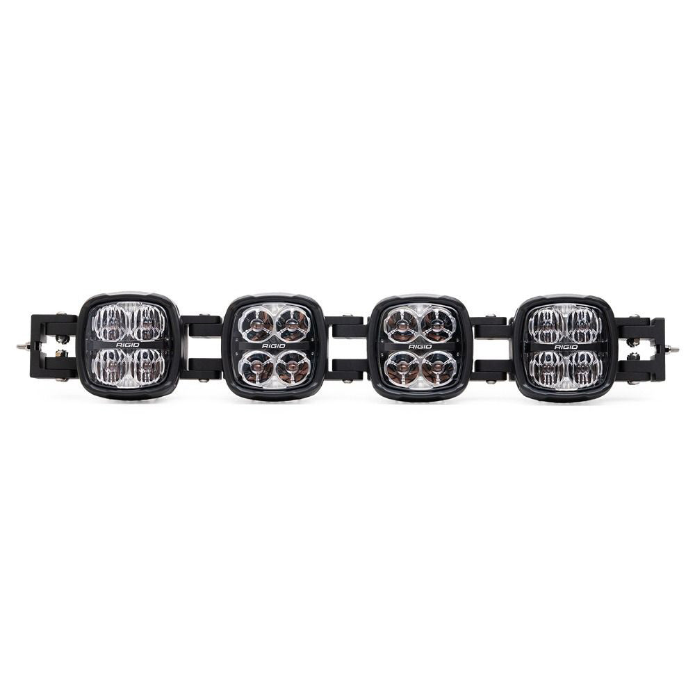 Rigid Industries LED light bar for off-road vehicle lighting, featuring four square pods with clear lenses and black housing.
