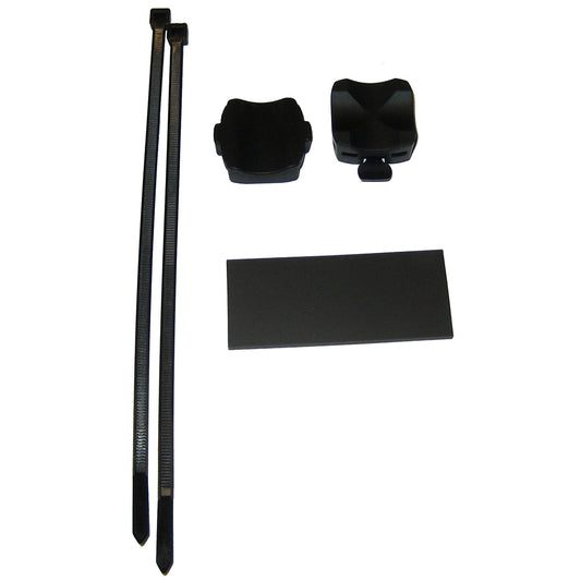Black car audio installation kit with zip ties, mounting brackets, and adhesive pad for secure setup