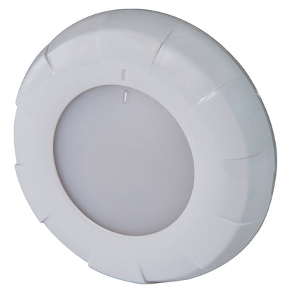 White circular LED puck light with textured bezel for auto or home installation