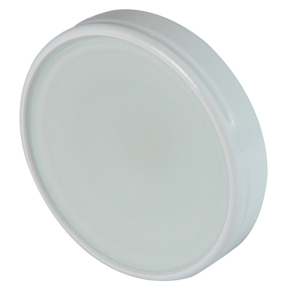 White circular LED puck light for under-cabinet or accent lighting installation
