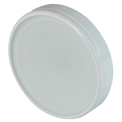 White circular LED puck light for under-cabinet or accent lighting installation