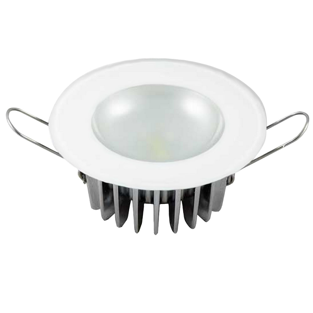 White LED recessed light with heat sink fins and mounting clips for residential or commercial installation