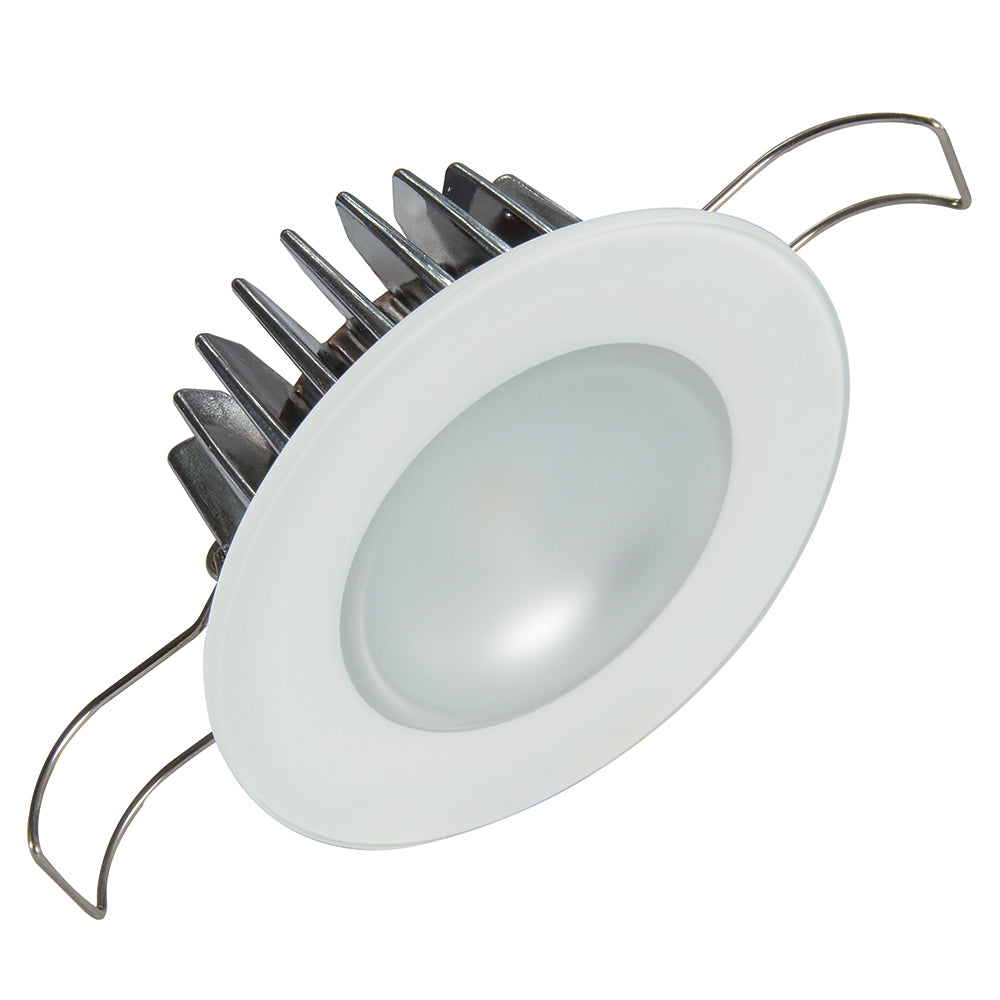 White LED recessed ceiling light with heat sink and mounting clips for residential or commercial use