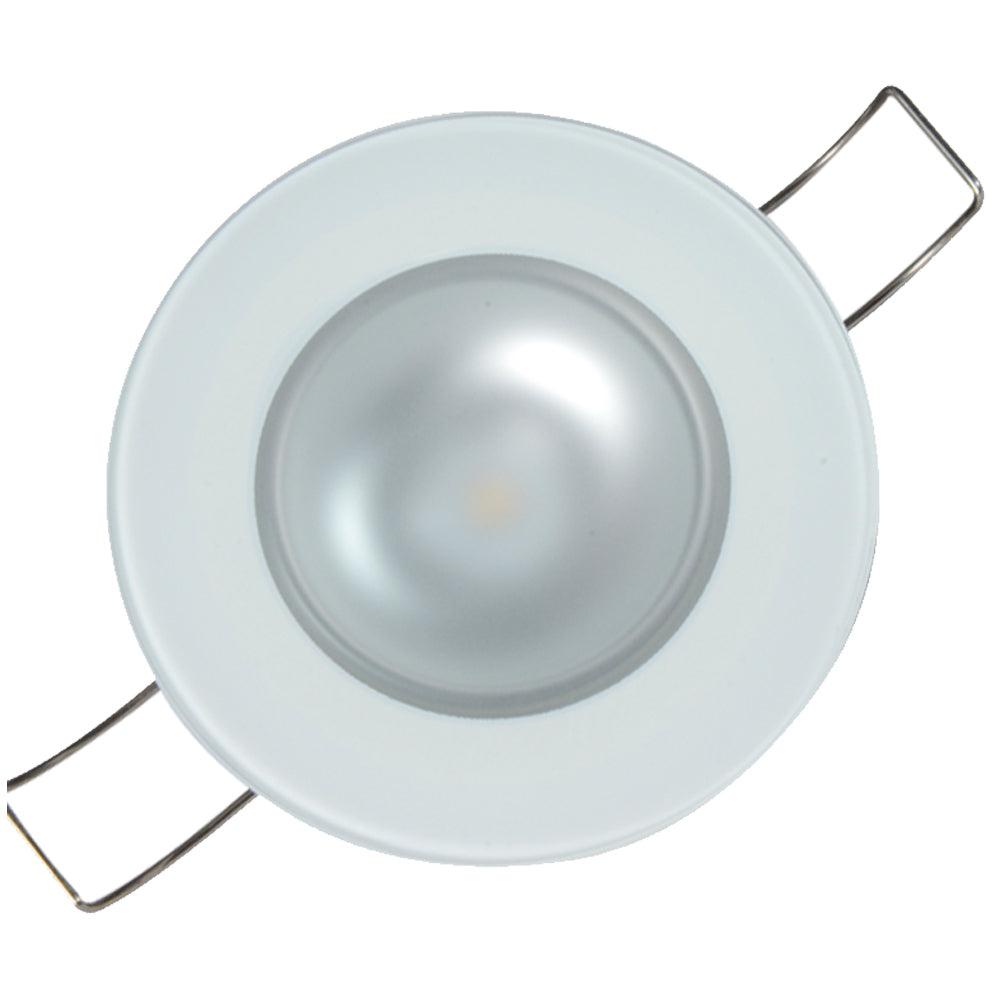 White LED recessed light fixture with metal mounting clips for residential or commercial installation