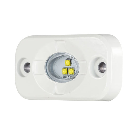 White LED puck light with three yellow diodes, ideal for auto or residential lighting installations