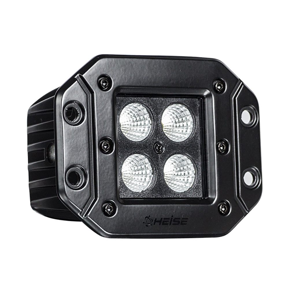 Black HEISE LED work light with four circular lenses, rugged off-road lighting for vehicles