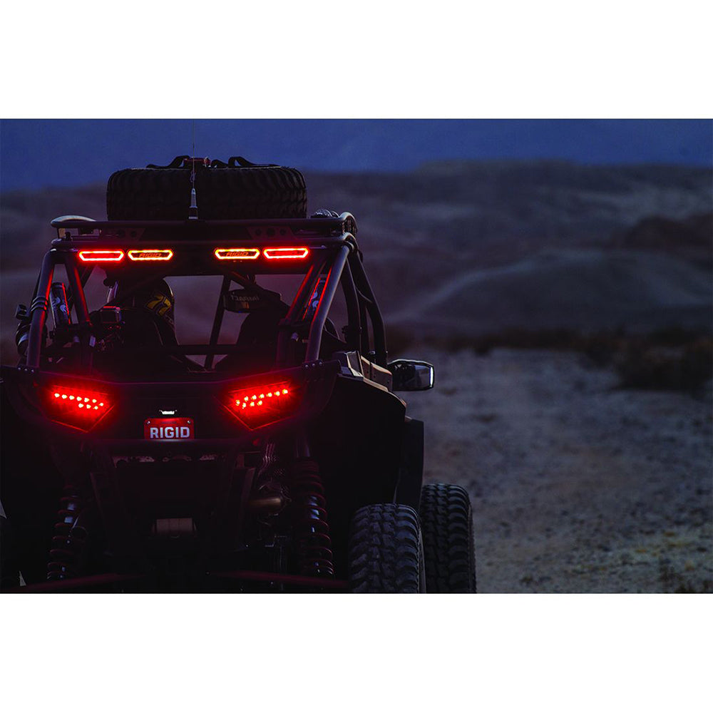 Rigid LED rear lights on UTV at dusk, off-road lighting for desert terrain