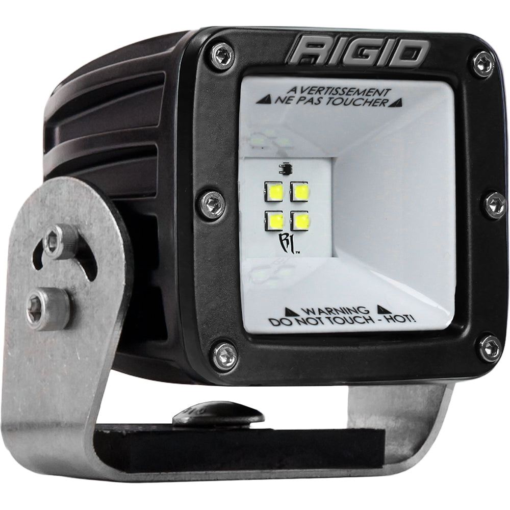 Rigid Industries LED work light with warning label, durable black housing, and metal mounting bracket