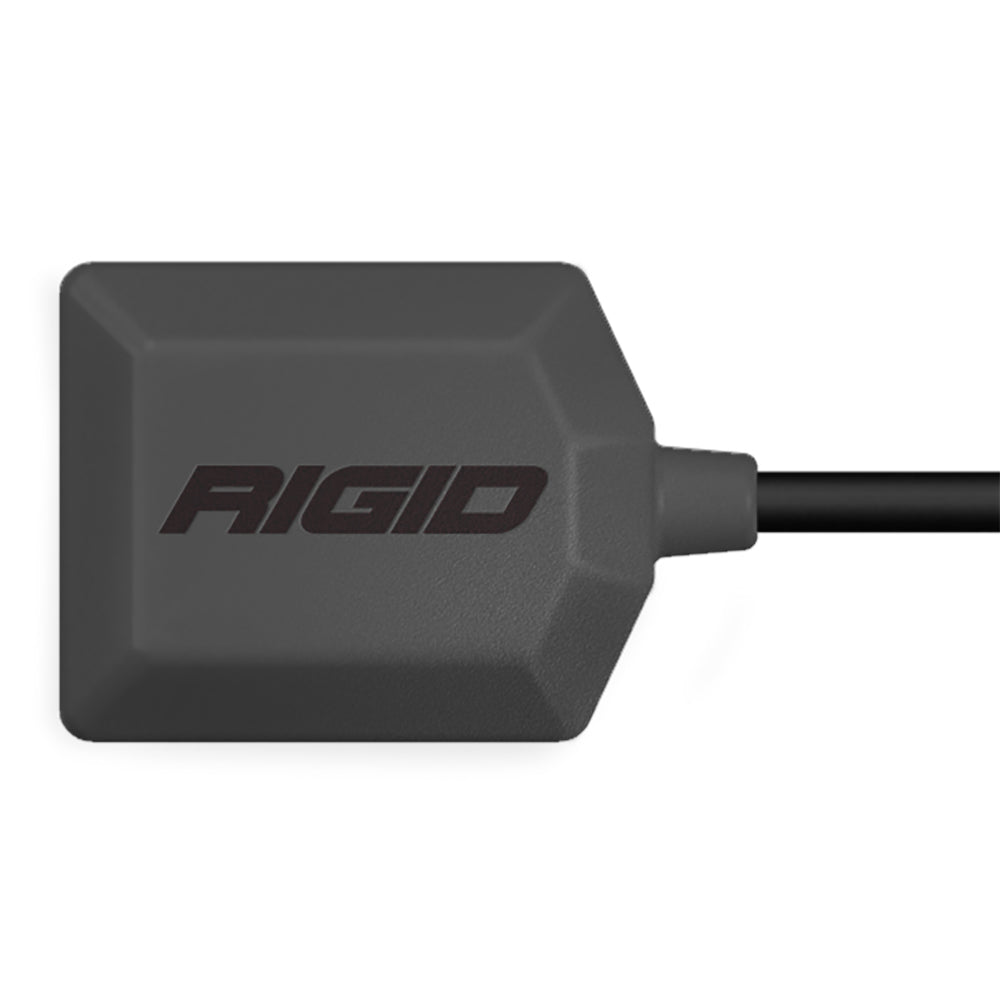 Rigid Industries LED light pod with black housing and cable, durable off-road lighting solution