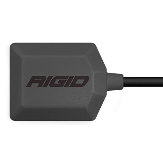 Rigid Industries LED light pod with black housing and cable, durable off-road lighting solution