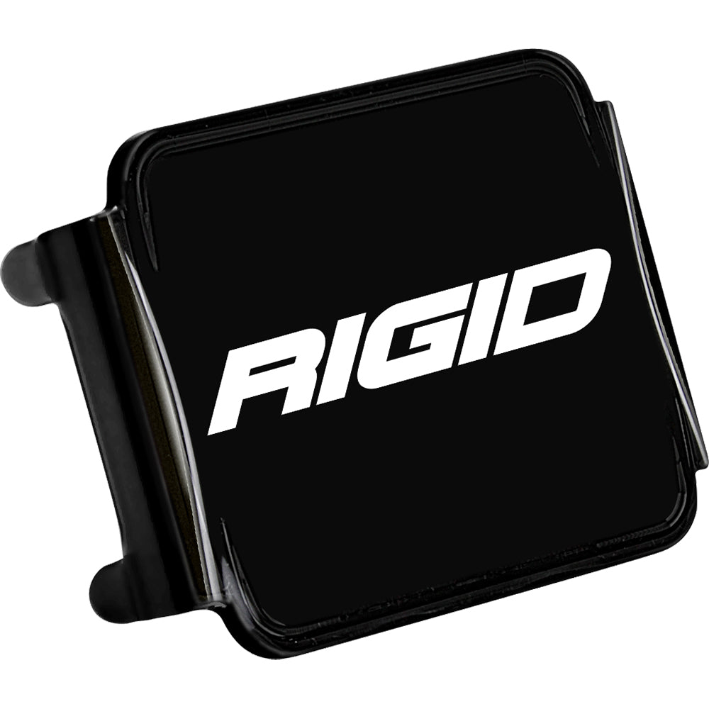Black Rigid Industries hitch cover with white logo, durable truck accessory for off-road lighting