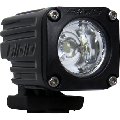 Rigid Industries LED light pod for off-road and automotive use, compact black housing with clear lens