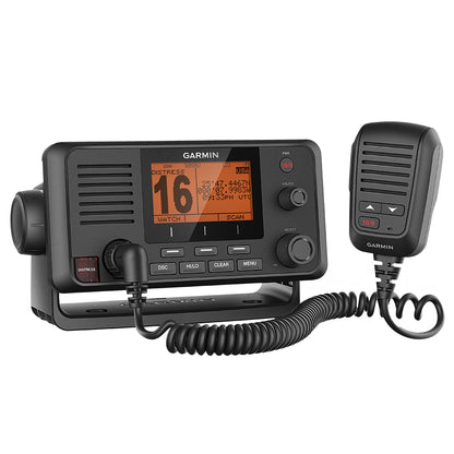 Garmin marine VHF radio with handheld mic, displaying channel 16 and GPS coordinates for boating safety.