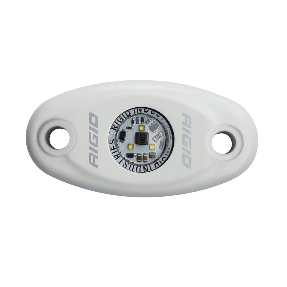 Rigid Industries LED light pod with exposed circuitry, white housing, and mounting holes for vehicle or marine use.