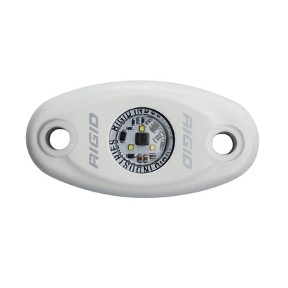 Rigid Industries LED light pod with exposed circuitry, white housing, and mounting holes for vehicle or marine use.