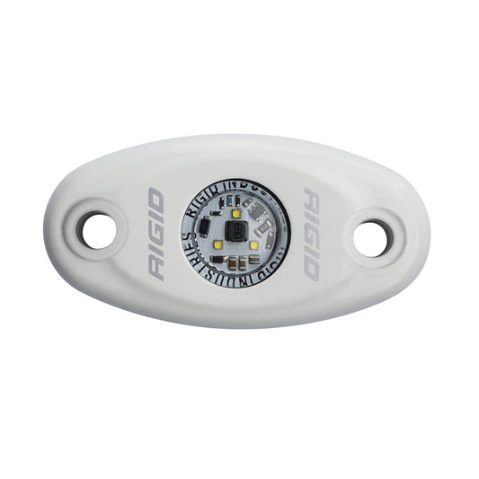 Rigid Industries LED light pod with exposed circuitry, white housing, and mounting holes for vehicle or marine use.