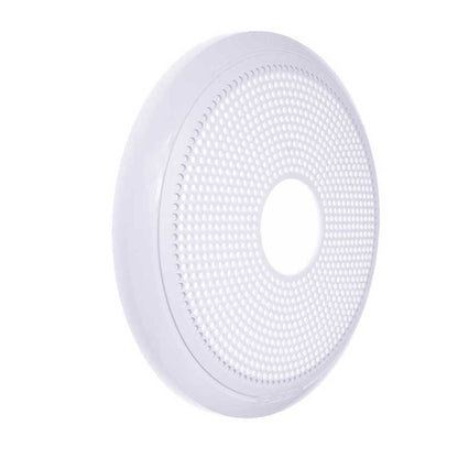 White circular speaker grille with perforated design for car audio installation