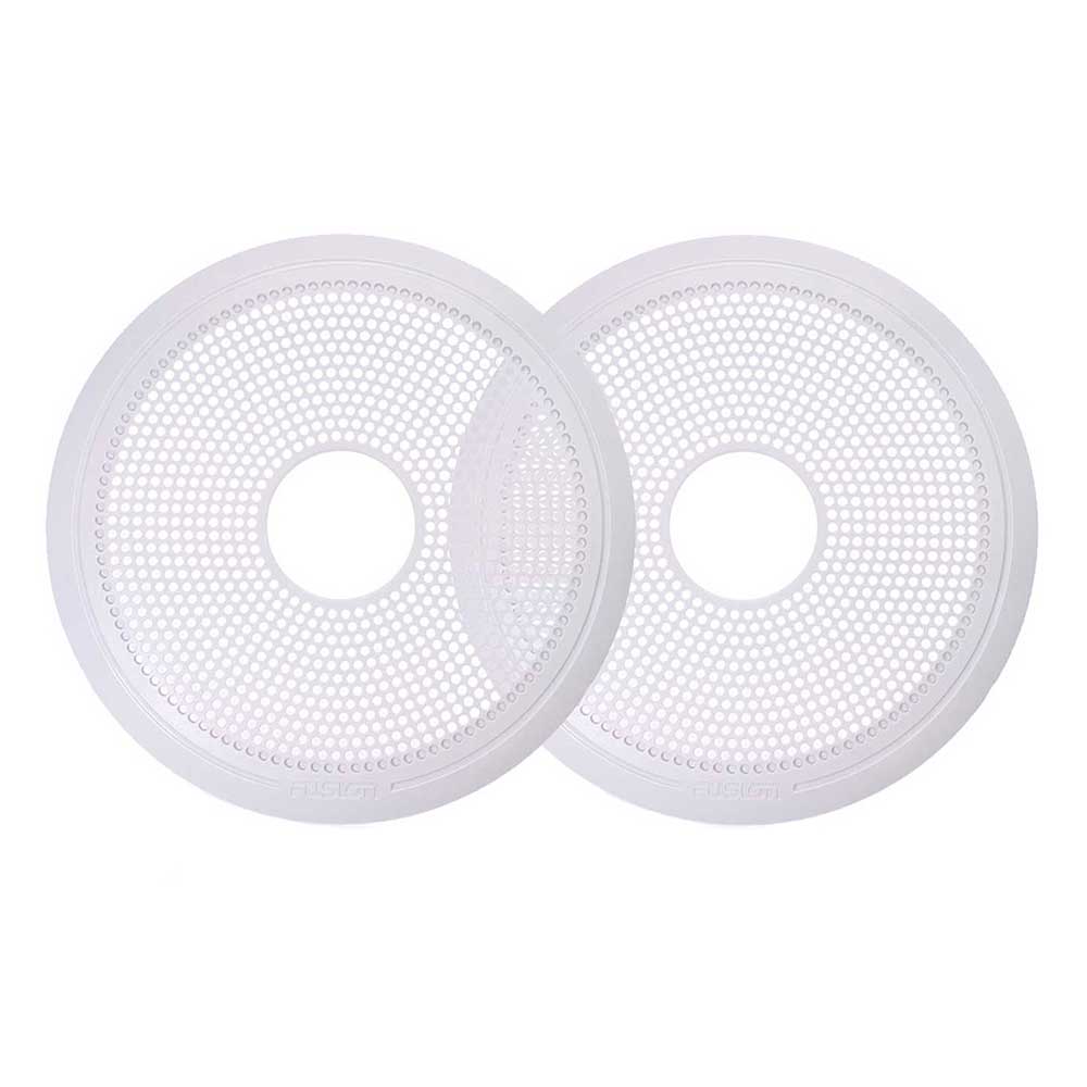 White circular speaker grilles with perforated design for car audio systems