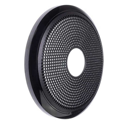 Black circular speaker grille with perforated design for car audio systems