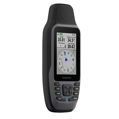 Garmin handheld GPS device displaying speed, distance, and compass for outdoor navigation