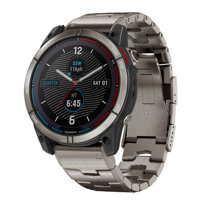 Garmin Quatix smartwatch with stainless steel band, displaying speed and time on black dial