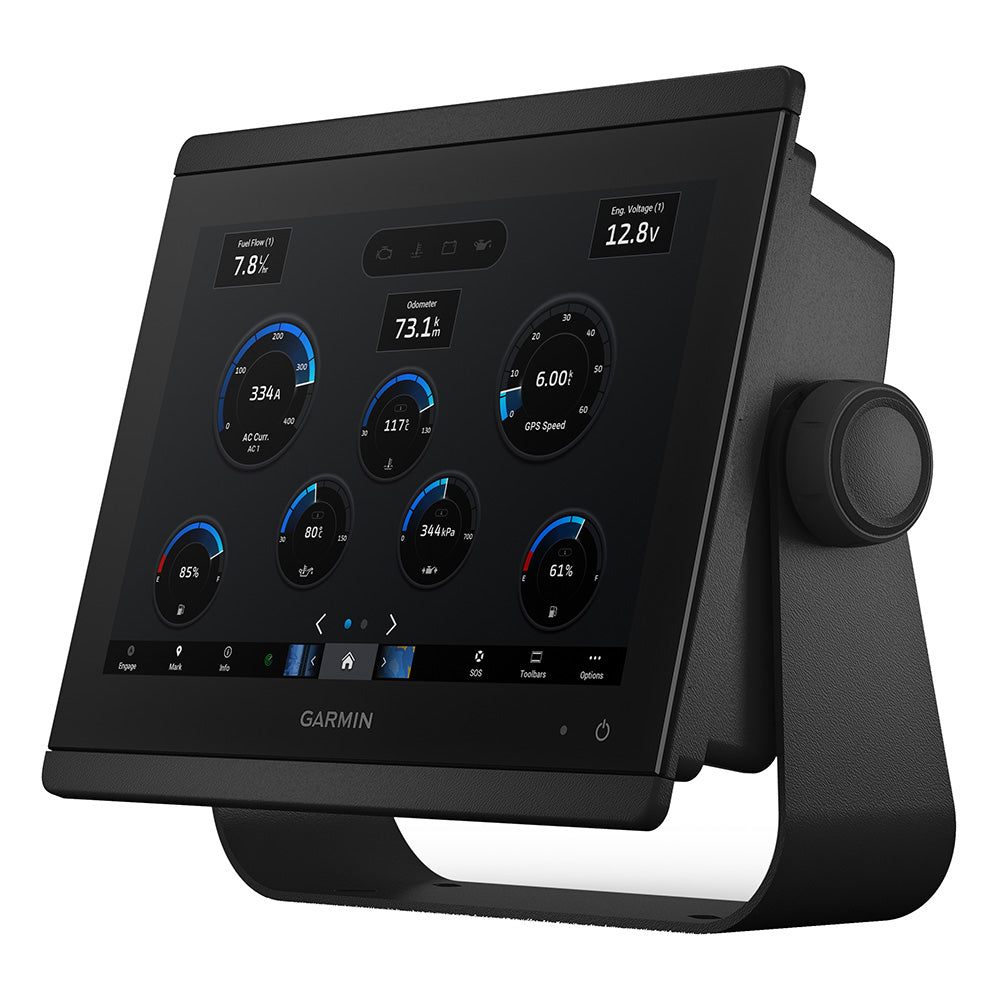 Garmin marine display showing engine stats, GPS speed, and fuel flow on a black touchscreen dashboard.