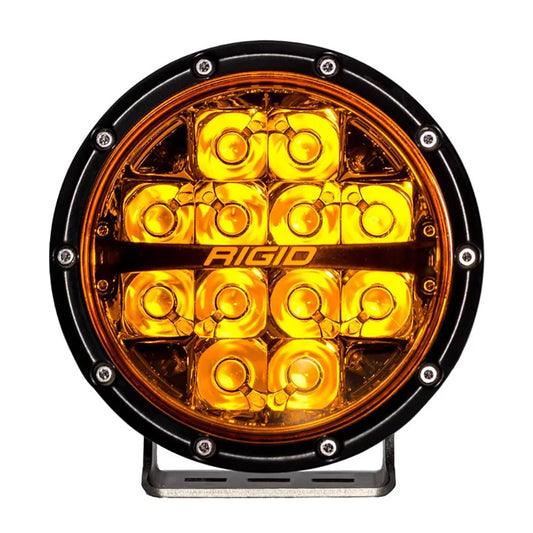 Rigid amber LED off-road light with black bezel and mounting bracket for vehicle illumination